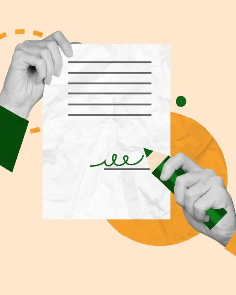 Manos sujetando papel firmado